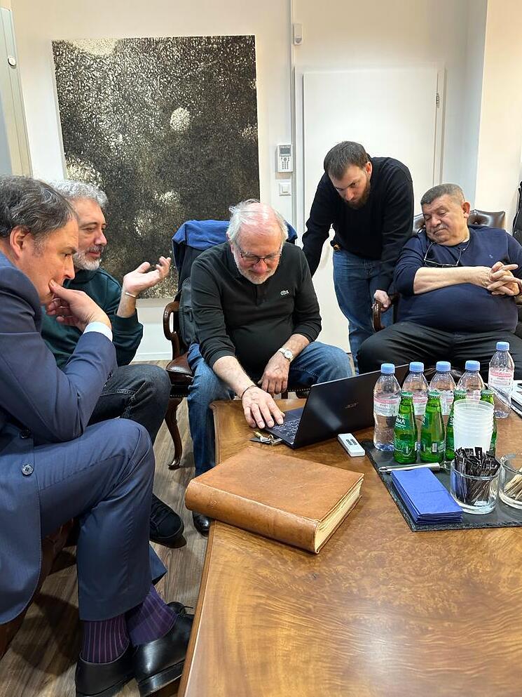 Andranik Ghazarian — Andranik Ghazarian with FINAIS specialists reviewing an examination.