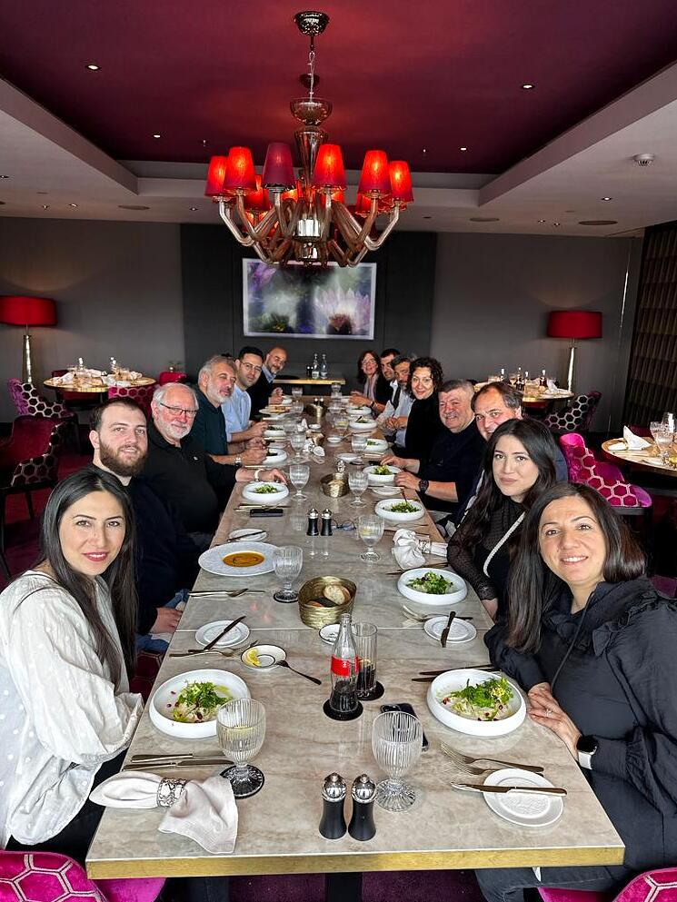 Andranik Ghazarian — Andranik Ghazarian with guests at a working dinner.